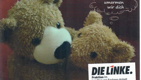 Bild: zwei Teddybären, die sich umarmen und küssen